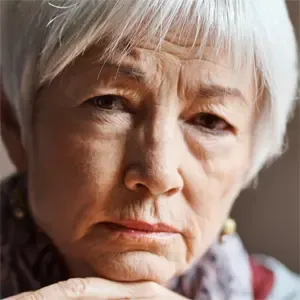 Mature woman looking concerned